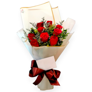 Bouquet of roses wrapped in pure white