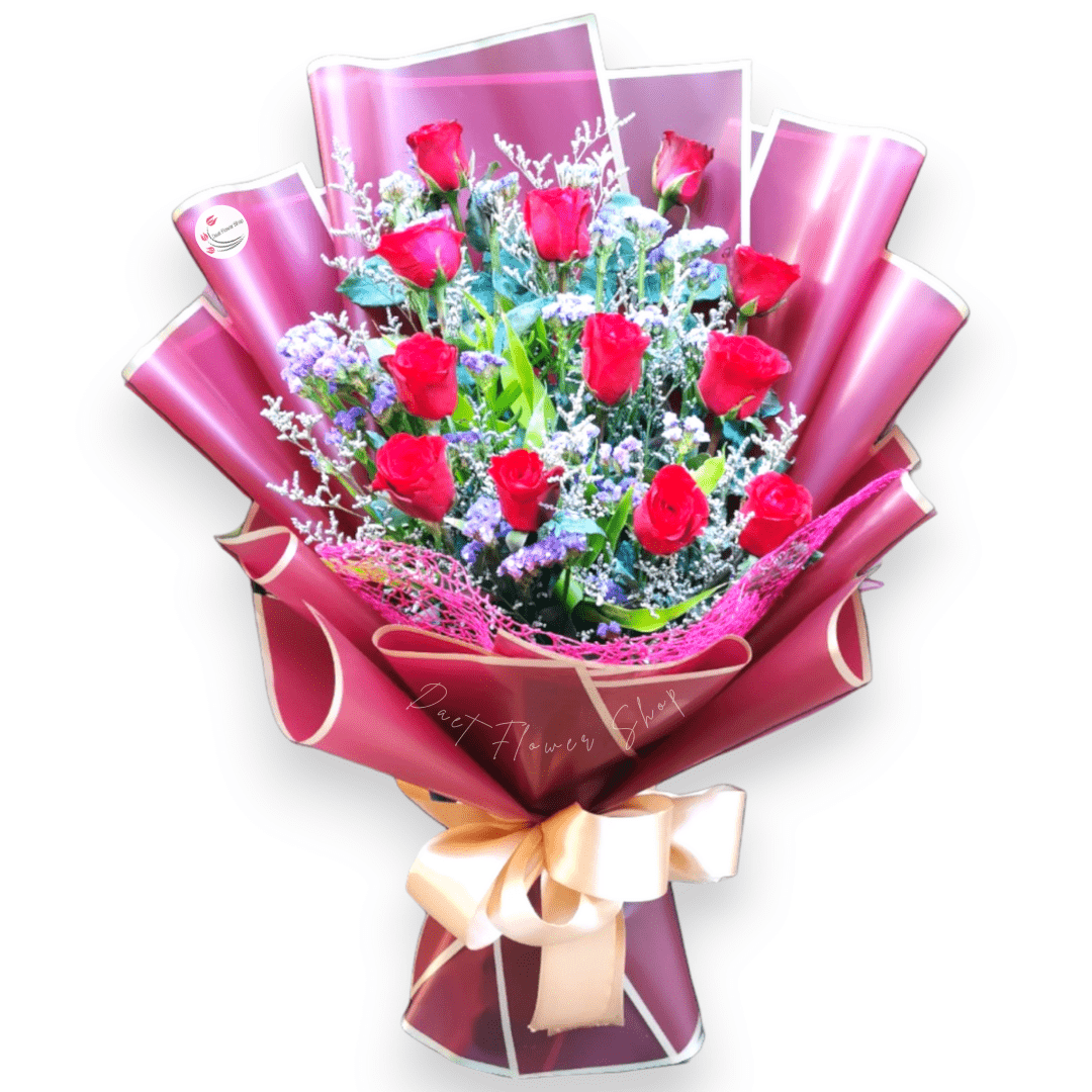 Bouquet of 12 red roses wrapped in maroon paper